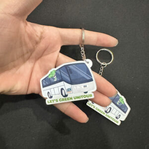 Móc khóa bus đại học kinh tế nền sáng